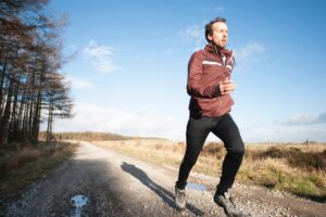 Man running outdoors on a path