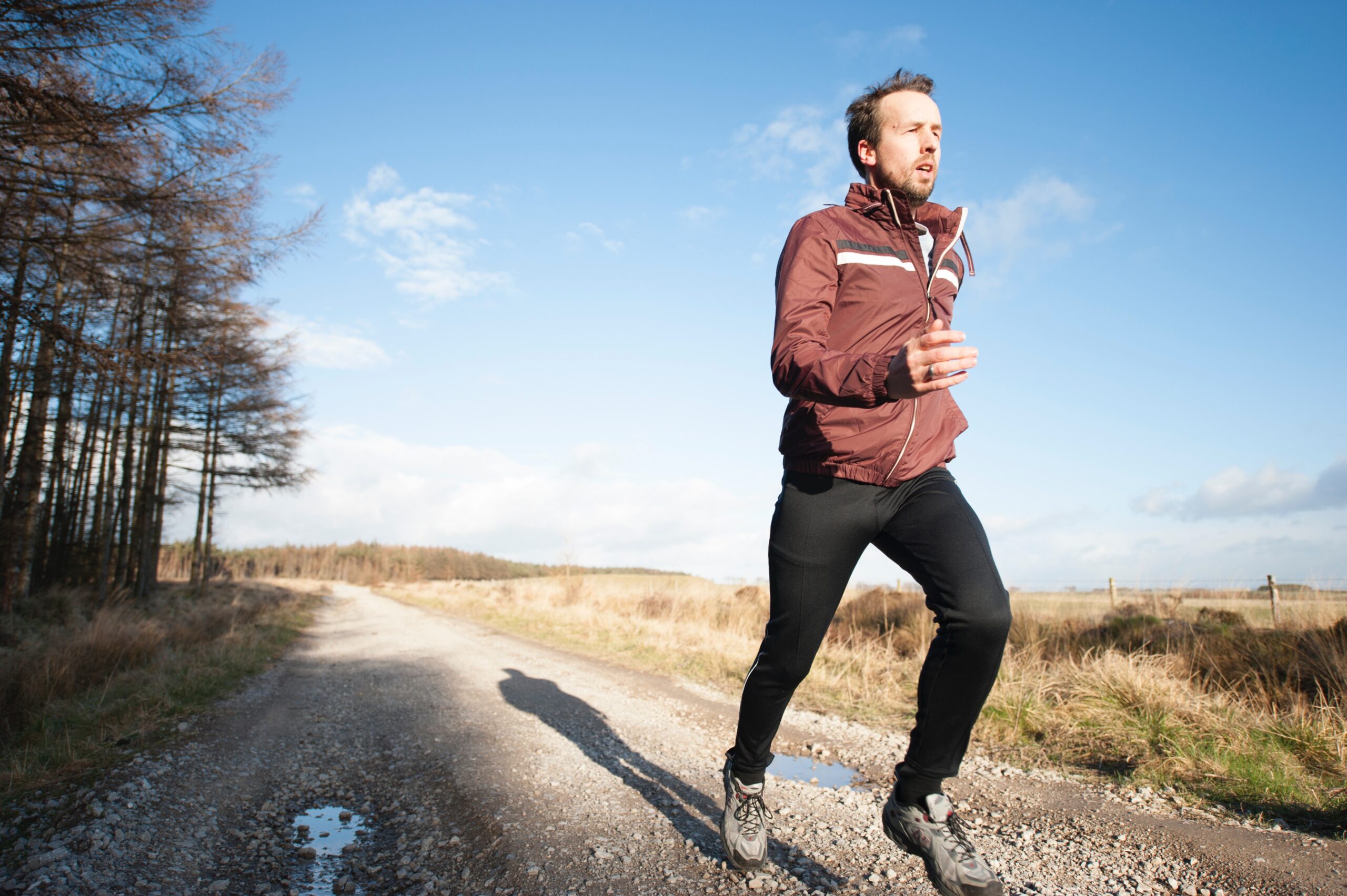 Man running outdoors on a path