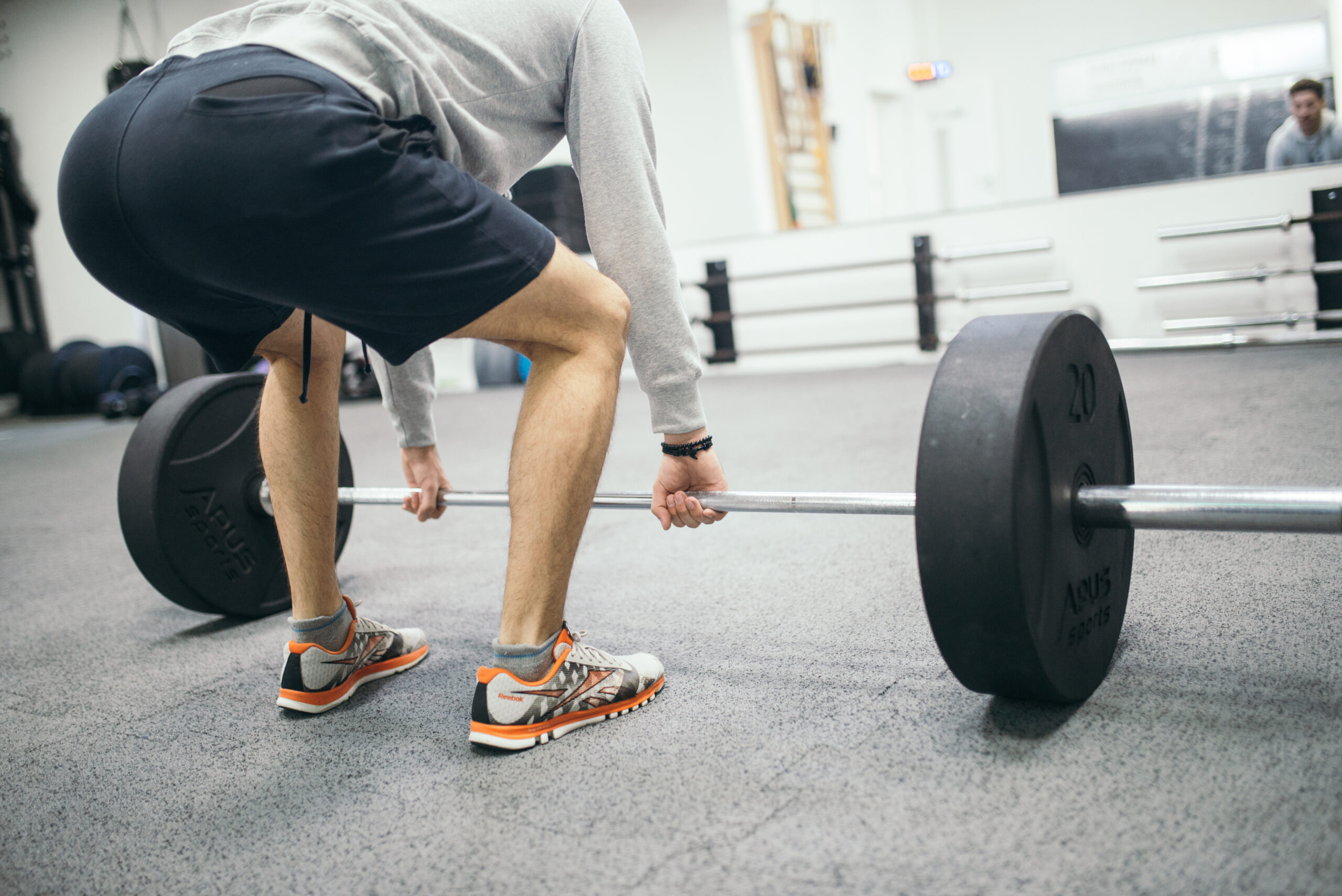 Man performing a deadlift in the gym